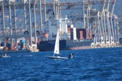 LASER, V OZADJU LUKA KOPER
